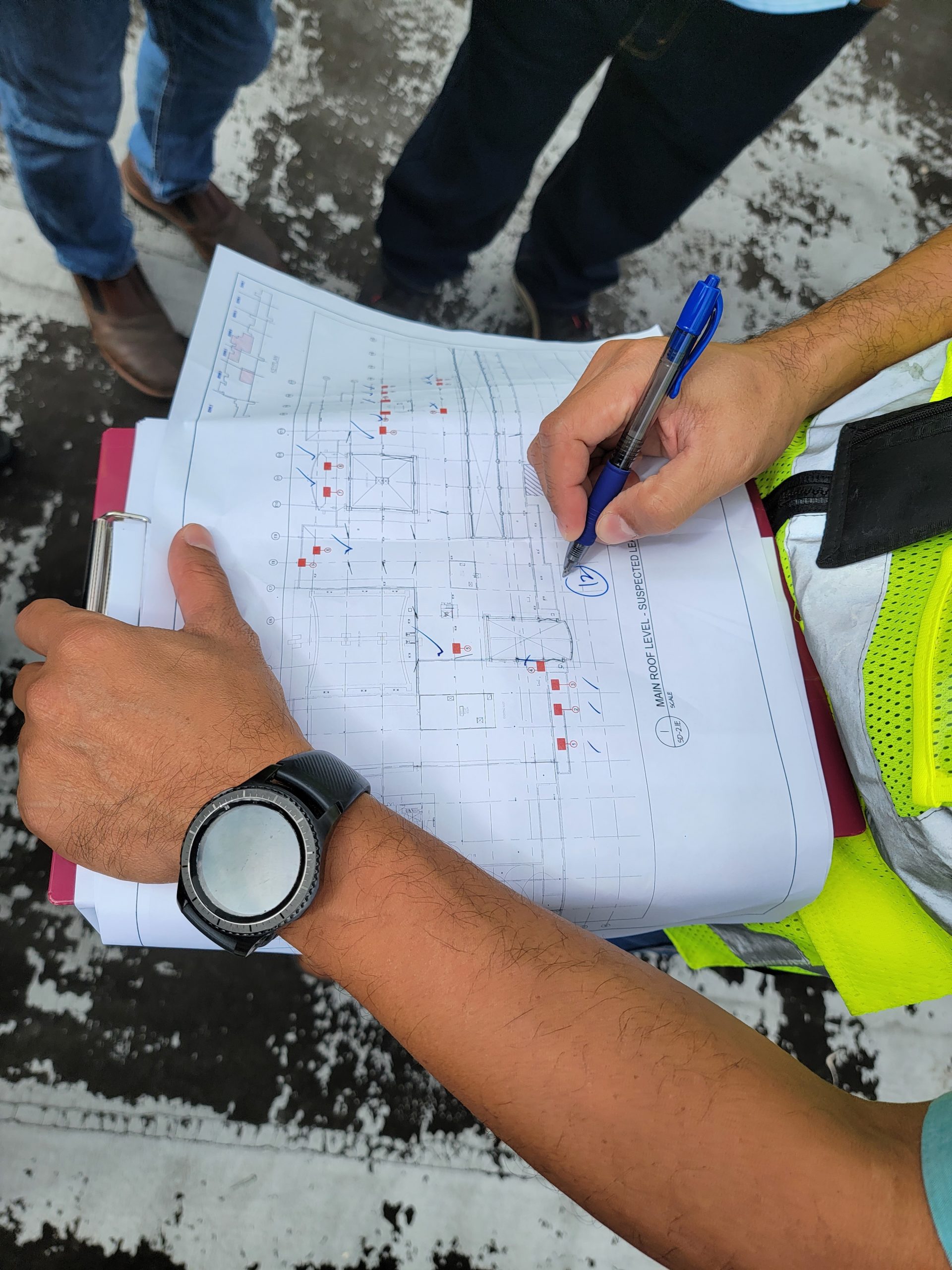 writing on clipboard KHLG Licensed Engineering Firm